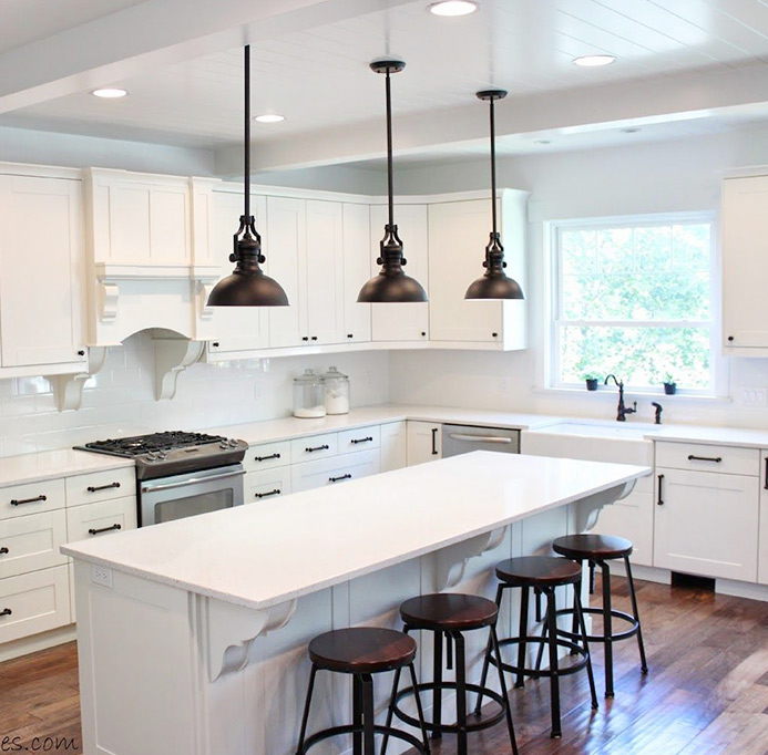 Inviting kitchen with ample space, natural light, and modern finishes