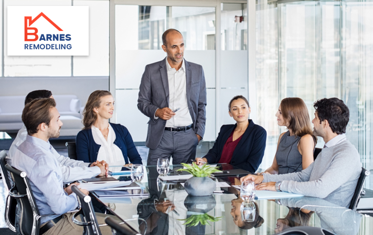 Consultation meeting regarding Milpitas building permit requirements in an office setting