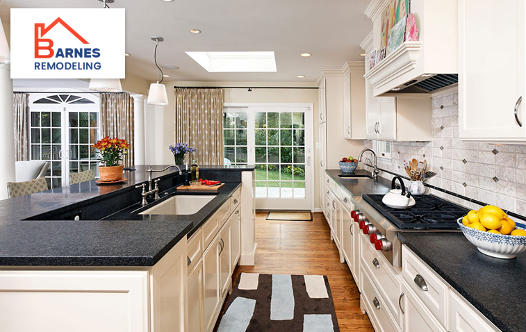 Bright and spacious galley kitchen with light-colored cabinets and open shelving.